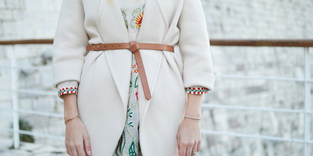 woman in white coat