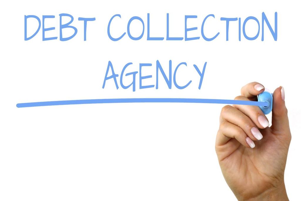 A Caucasian female handwriting Debt Collection Agency on a glass screen. 