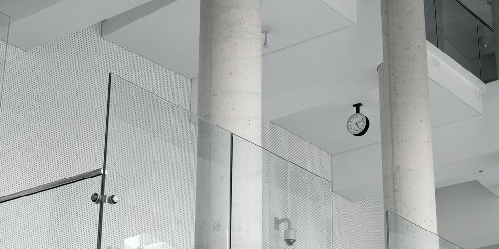 5 Signs Your Mississauga Bathroom Needs an Immediate Renovation black and white CCTV camera mounted on white wall