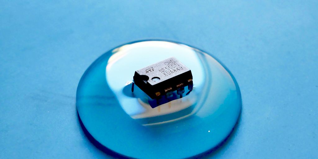 white and black cigarette pack on blue round plate