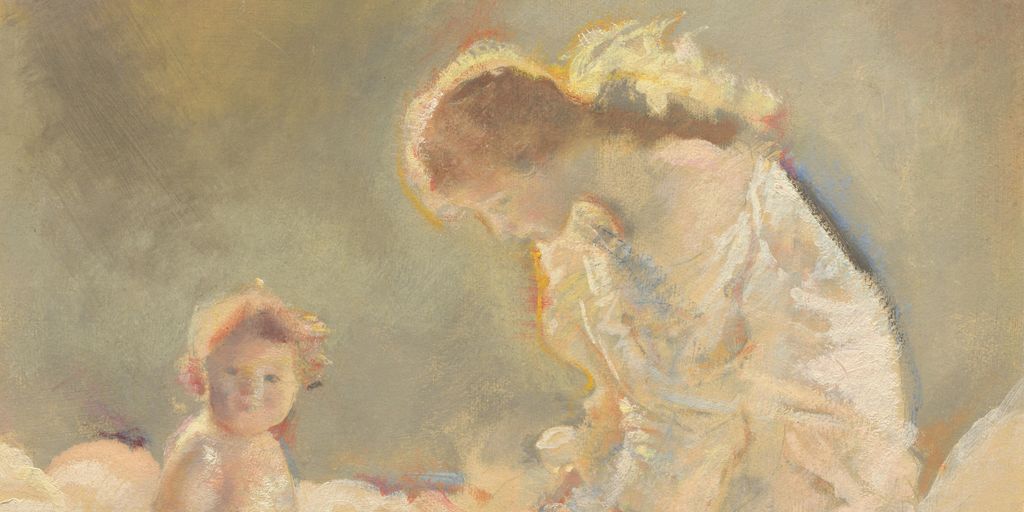 woman holding baby looking in mirror