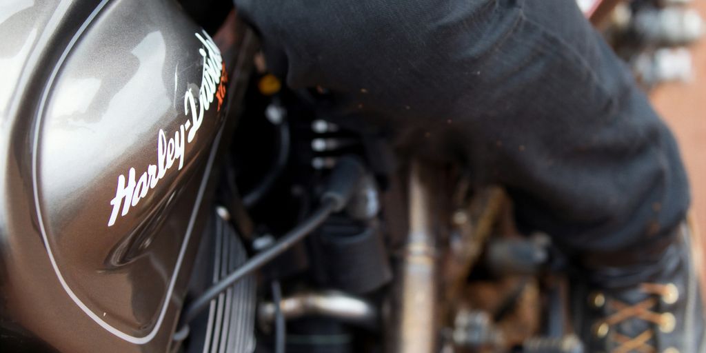 a person riding on the back of a motorcycle