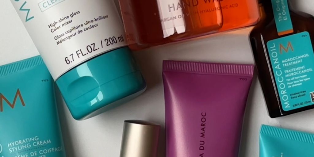 Assorted Moroccanoil branded beauty and haircare products in blue packaging.