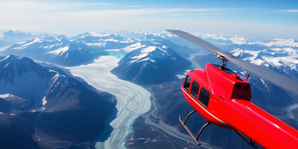 A red helicopter flies over vast, snow-covered Alaskan glaciers.