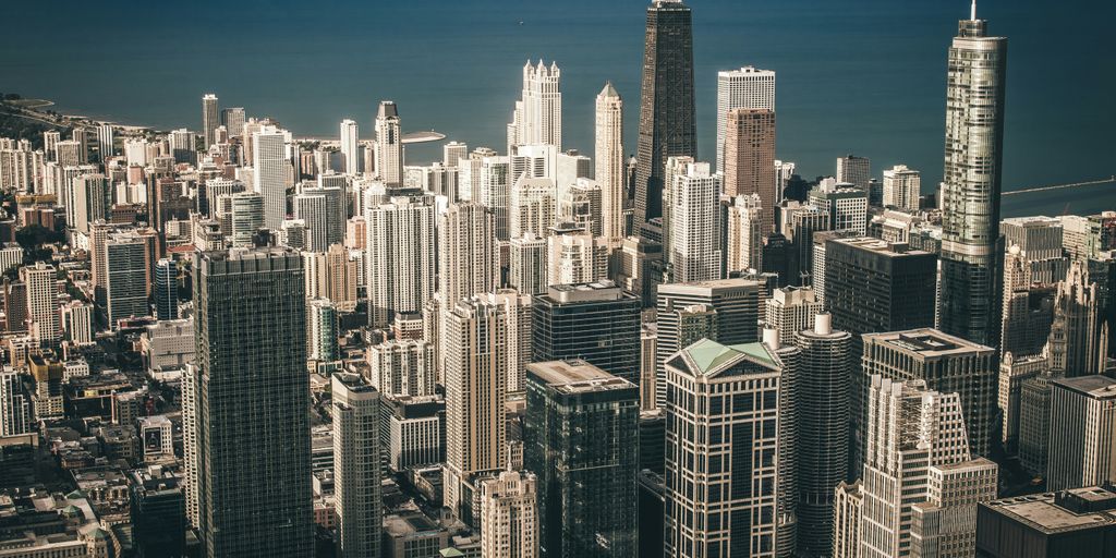 aerial view photography of city buildings near body of water