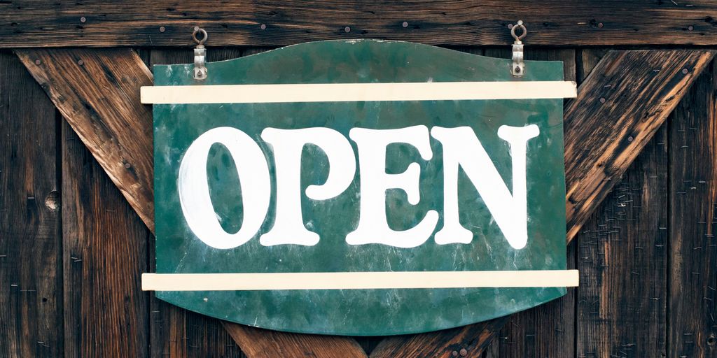 green and white open signage