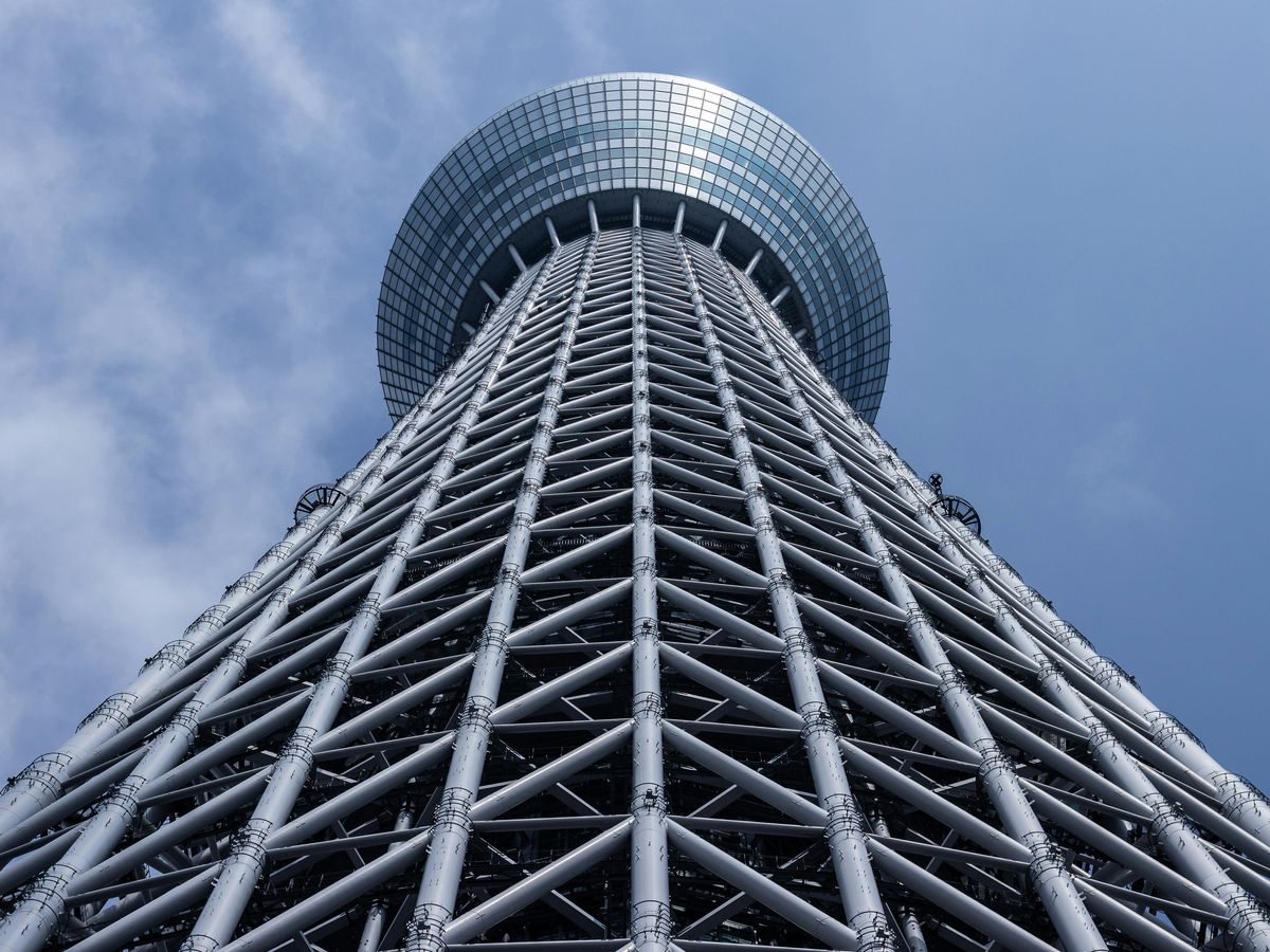grey tower with round top under grey cloudy sky