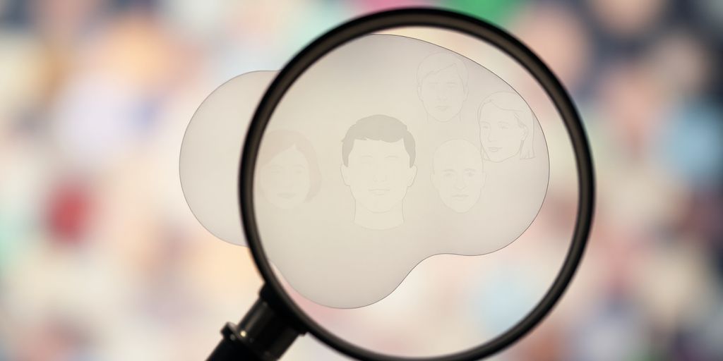 Magnifying glass over a thought bubble