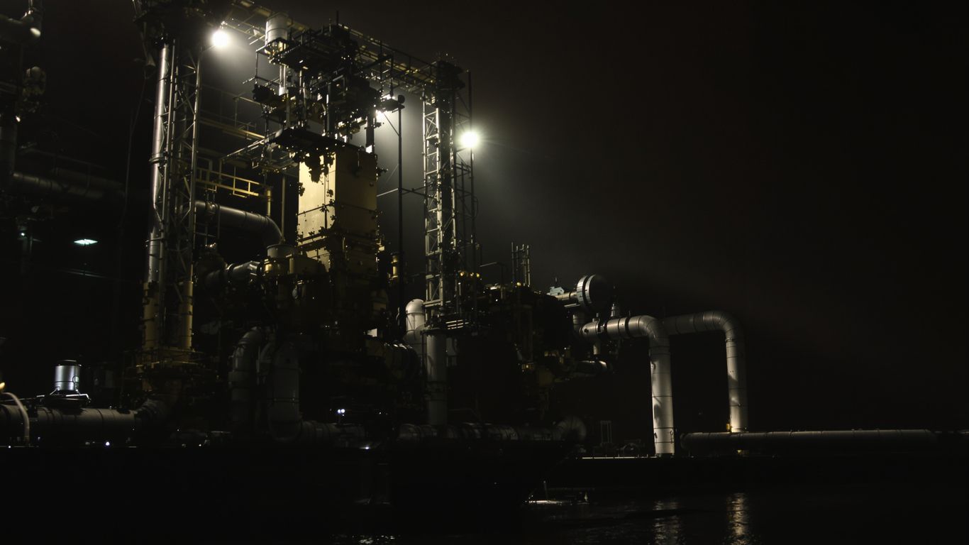 Industrial tank with subtle visual cues of challenges and opportunities.