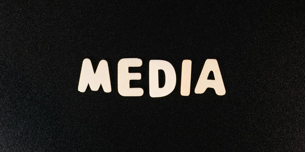 the word media spelled with white letters on a black background