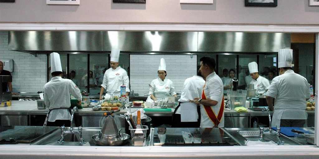 swimmer eating energy gel before competition