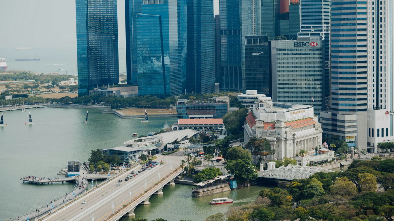 high-rise buildings near body of water during daytime