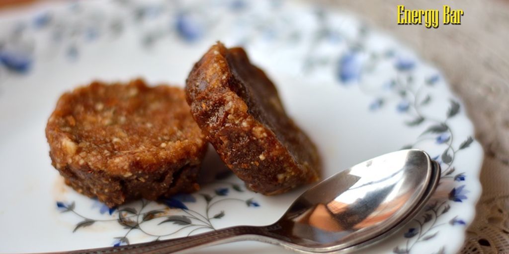 swimmer eating energy bar poolside