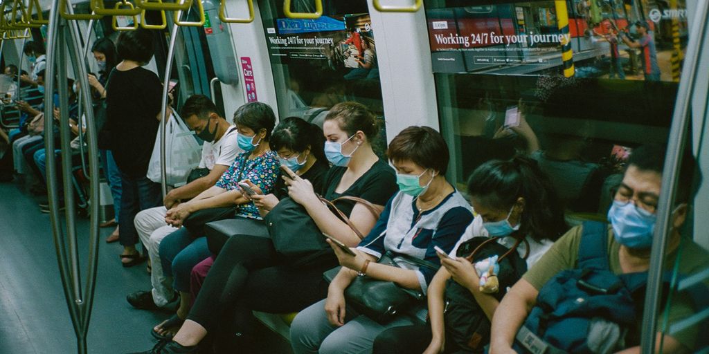 people sitting on train seat