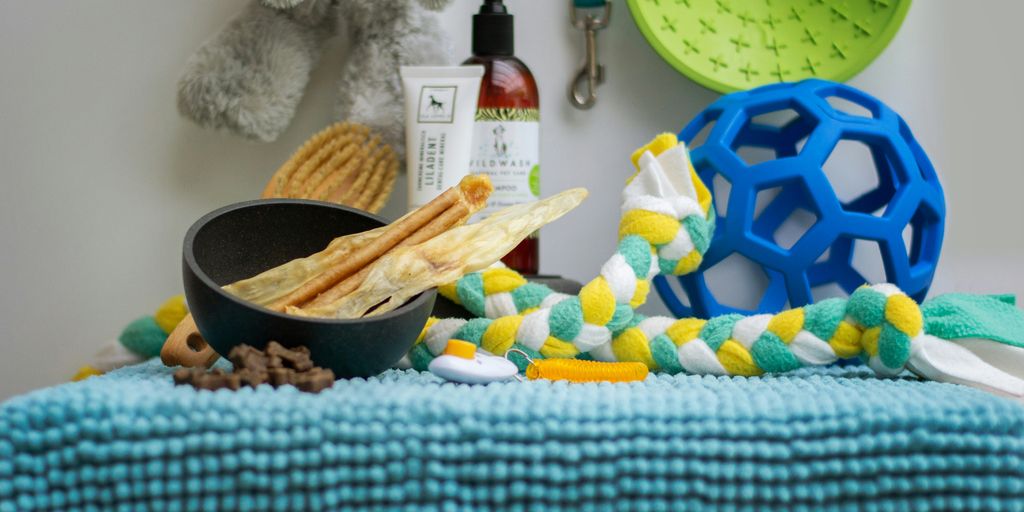 a table topped with a bowl of food and a bowl of crackers