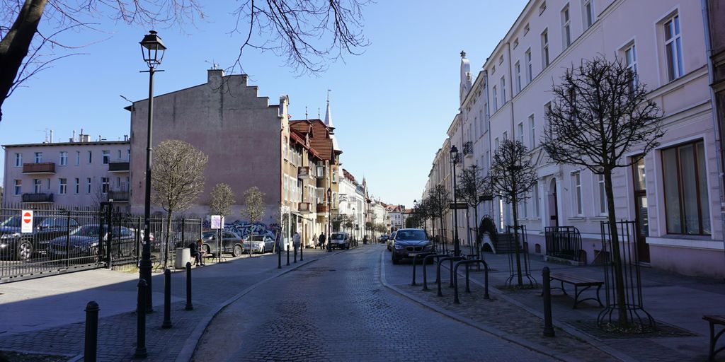 A street with buildings on both sides.