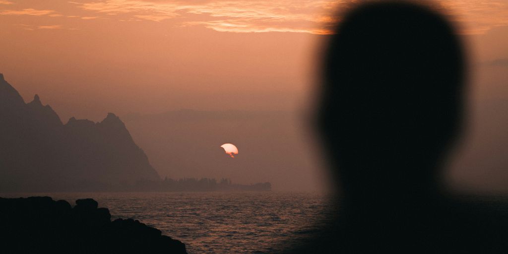 silhouette of man during golden hour