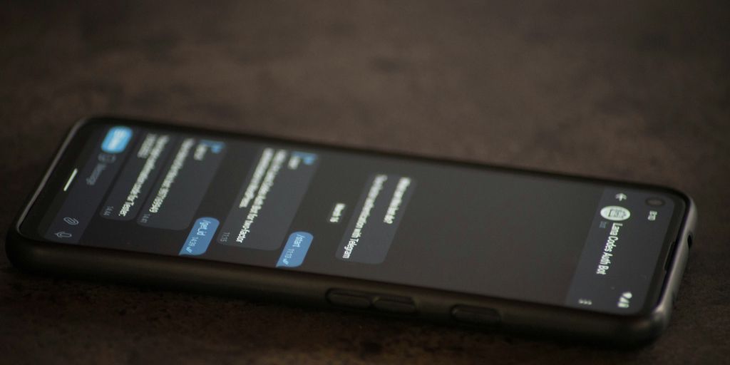 a close up of a cell phone on a table