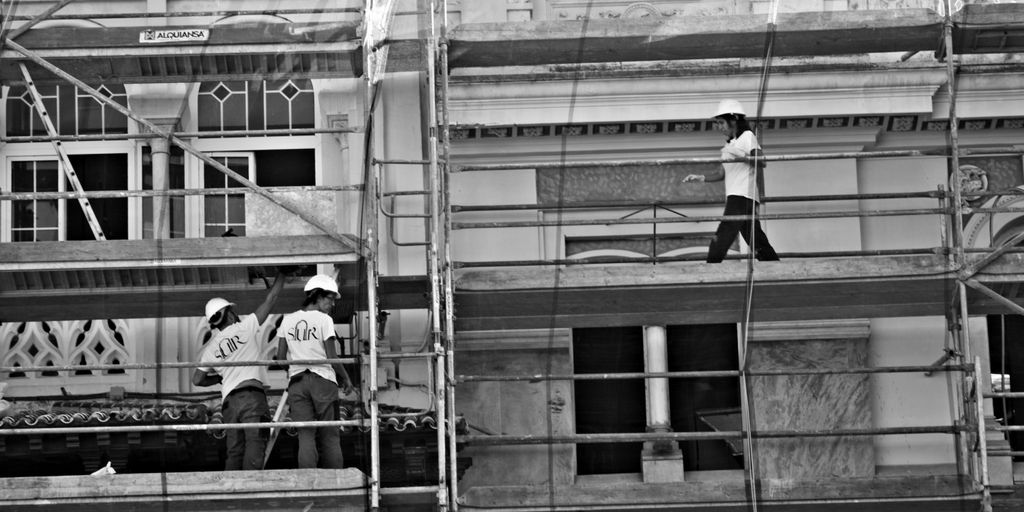 a group of men on a building