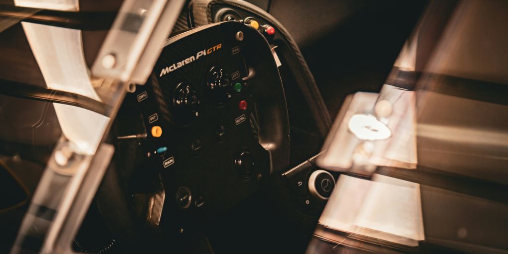 A steering wheel and dashboard of a car