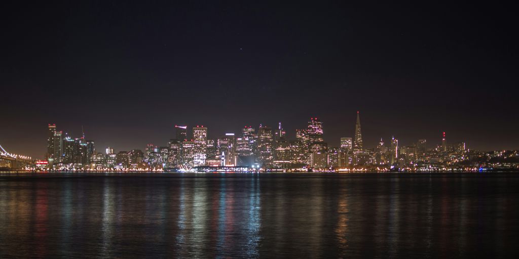city skyline during night time