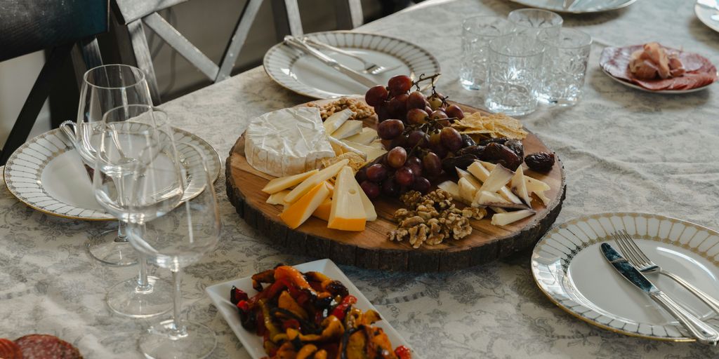 A table with plates of food on it