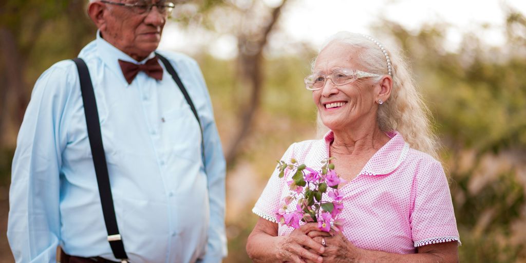 A man and a woman standing next to each other