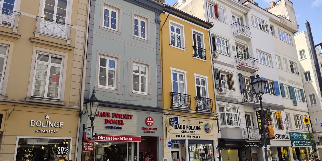 Blend of residential apartments above shops.