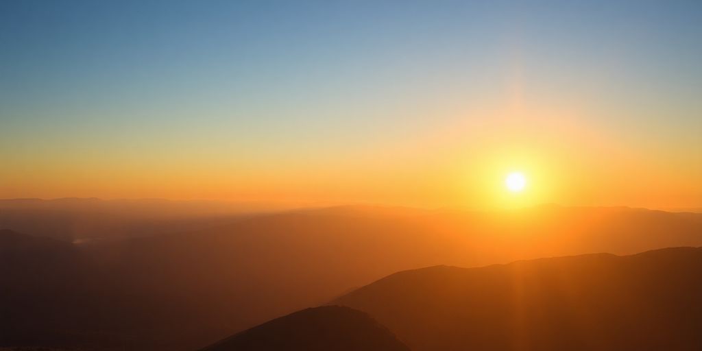 Sunrise over mountains symbolizing hope and faith.