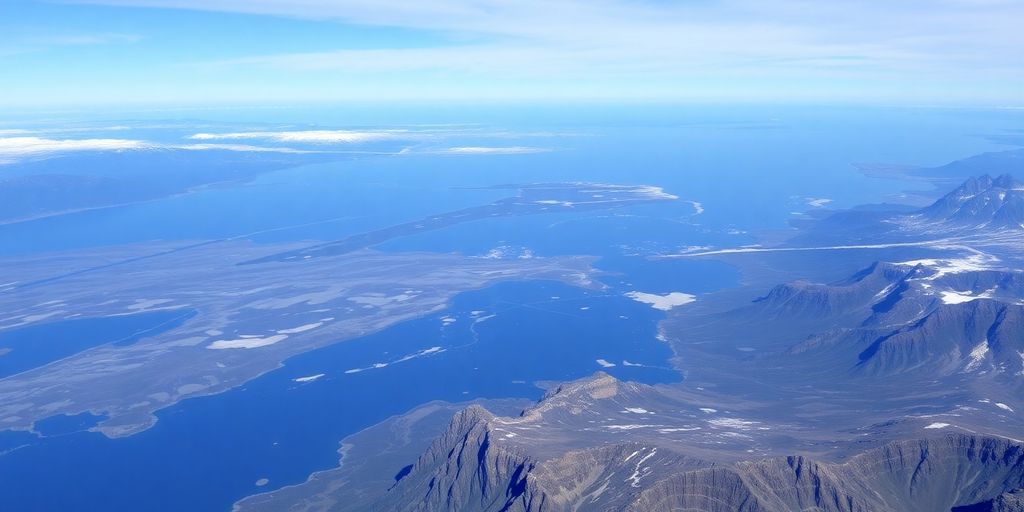 Bering Strait with coastlines and distant islands visible.