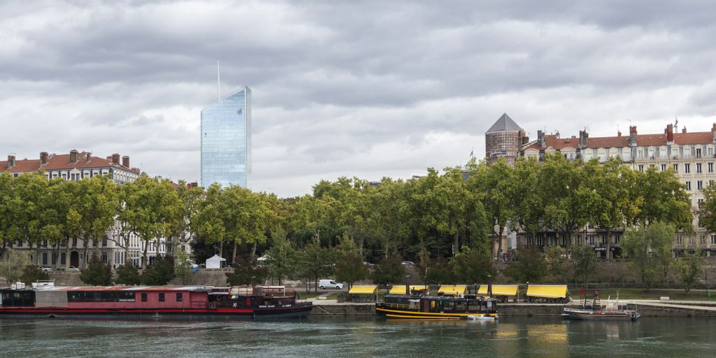 a body of water with a bunch of boats in it