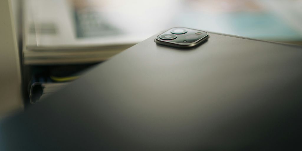 A remote control sitting on top of a table