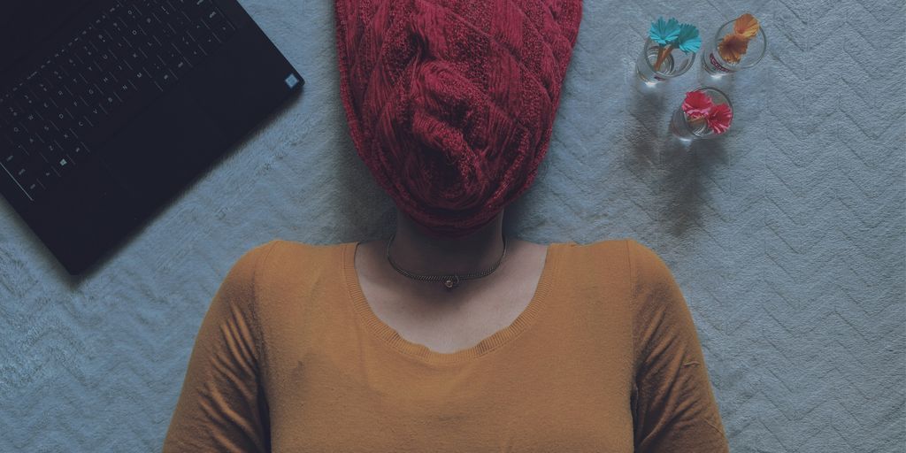 woman in brown long sleeve shirt