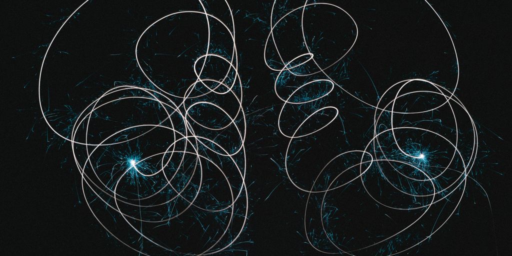 a black and white photo of a bunch of circles