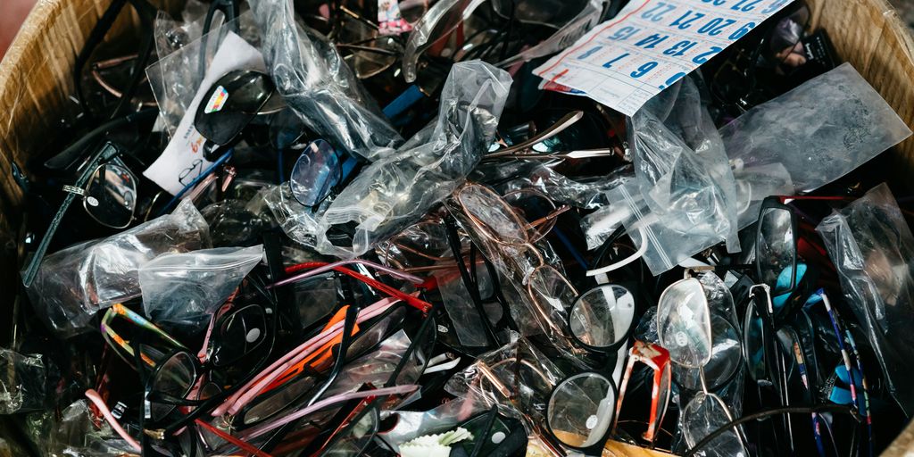 a basket filled with lots of different types of glasses