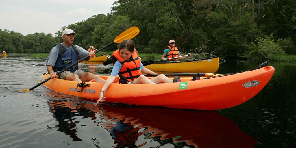 people kayaking and fishing at Ditto Landing Huntsville