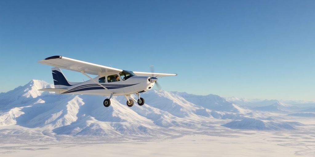 A certified pilot flies a small plane over Alaskan mountains.