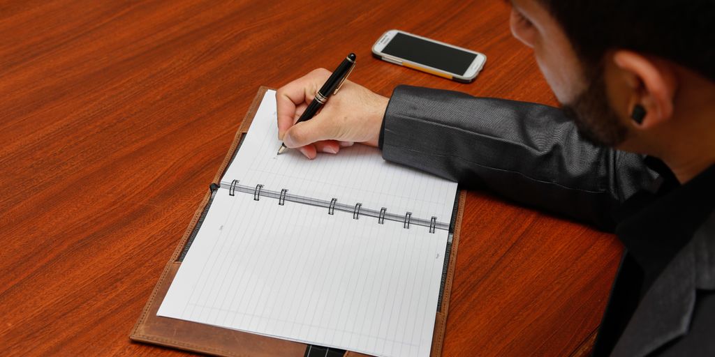 person using a writing tool on a computer, modern interface, creative workspace