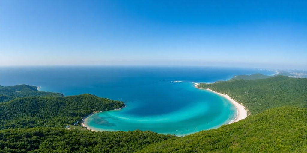 Coastal Phuket landscape with rolling hills.