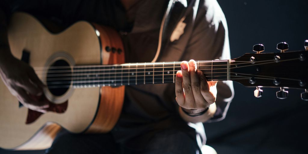 person playing guitar