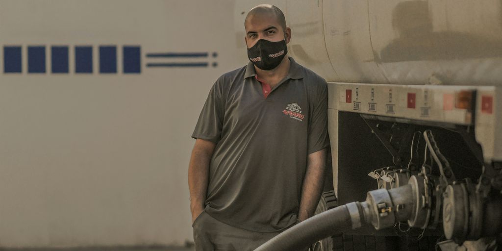 Top Benefits of HiAb Lorry Loader Hire for Your Business 3 man in gray crew neck t-shirt wearing black sunglasses