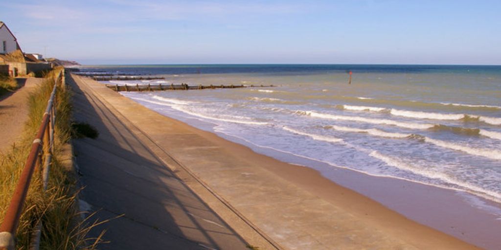 secluded beach in Norfolk with hidden pathways and natural scenery