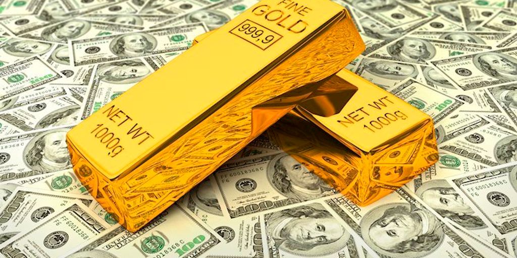 gold bars and US dollar