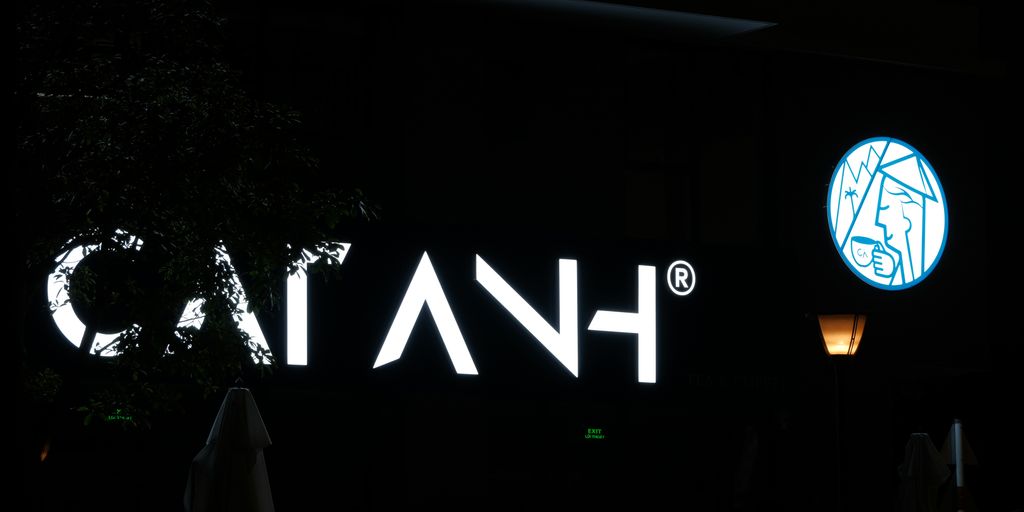 A sign that reads cia in a dark room