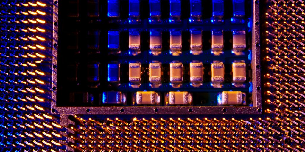 A close up of a metal structure with blue lights
