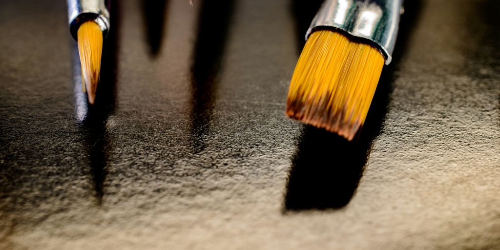 a close-up of a black and yellow pencil
