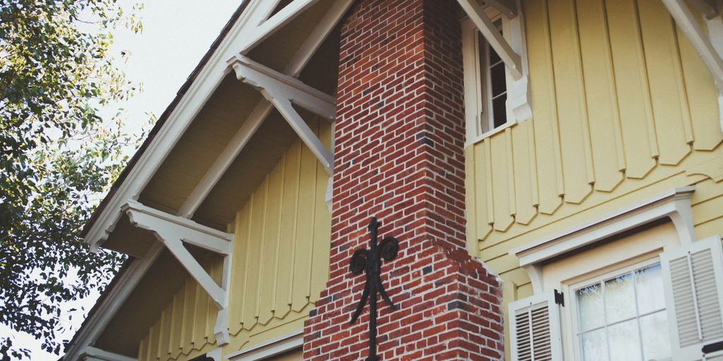 tree brown and white house