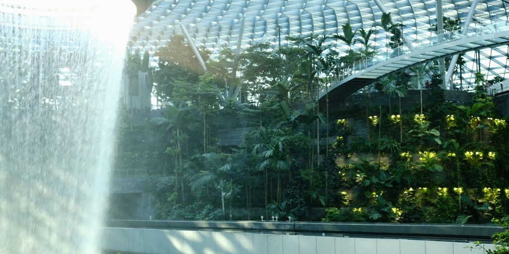 a building with a waterfall inside of it