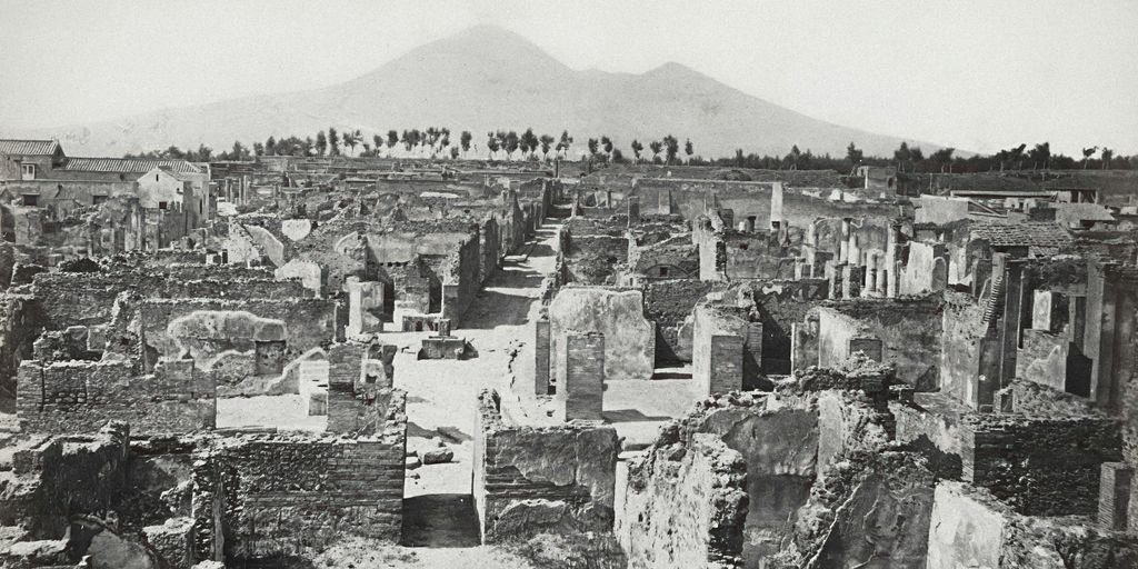 ancient ruins of Pompeii with Mount Vesuvius in the background