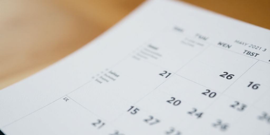 A close-up of a calendar with numbers.